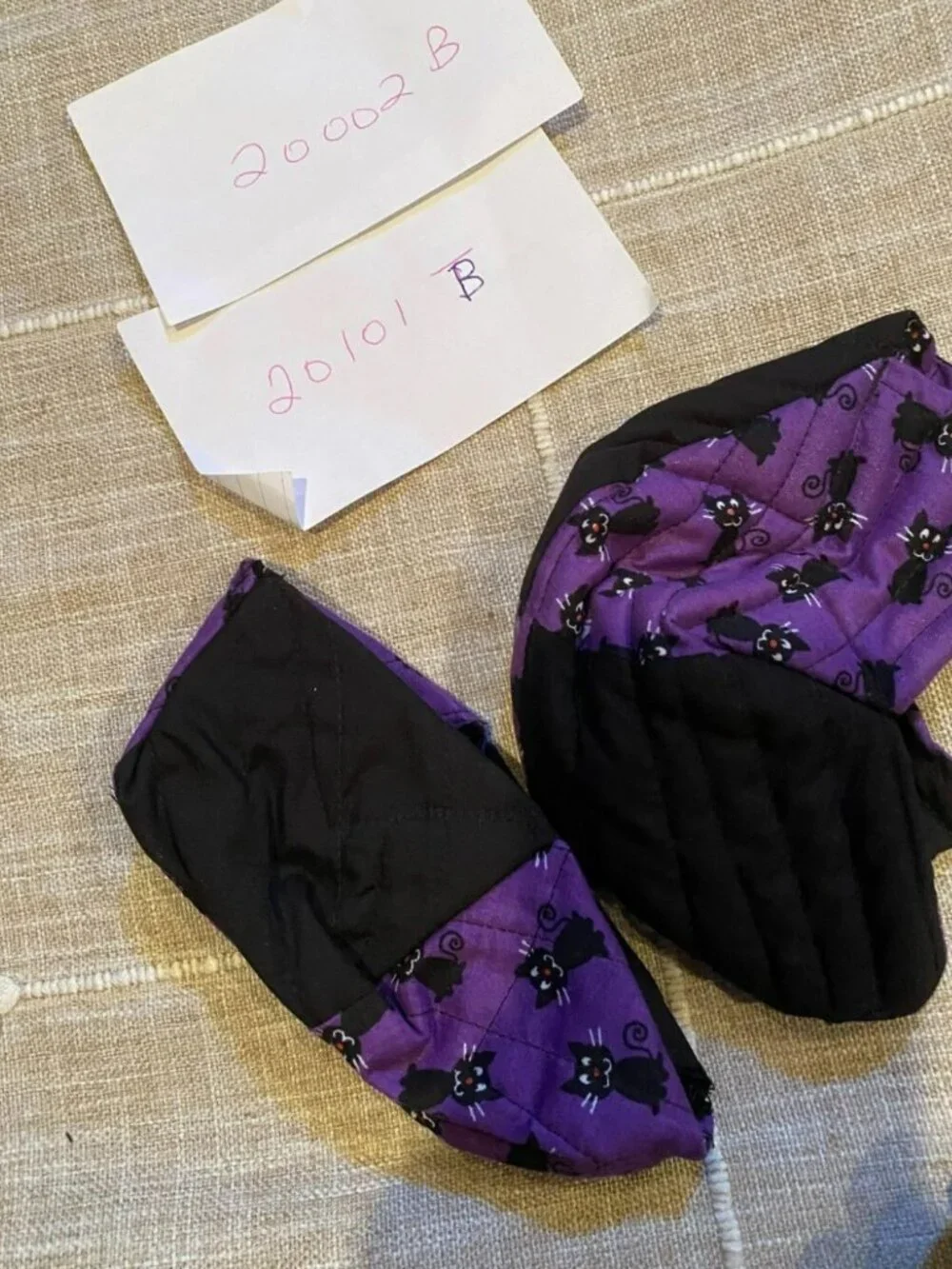 2 Fabric baskets, black cats, and Halloween placemat centerpiece